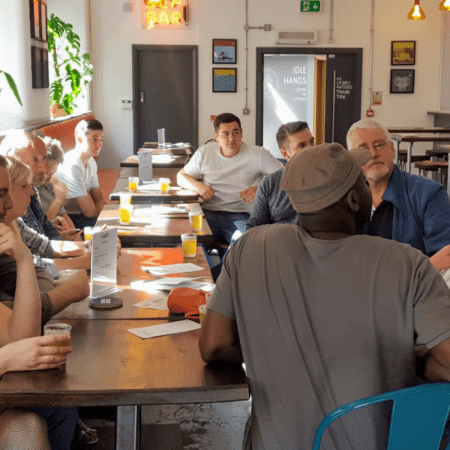 A group learns all about craft beer in Manchester from a local beer expert