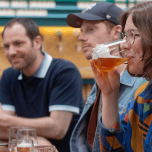 Group enjoying a Manchester brewery tour with beer tastings at a local taproom